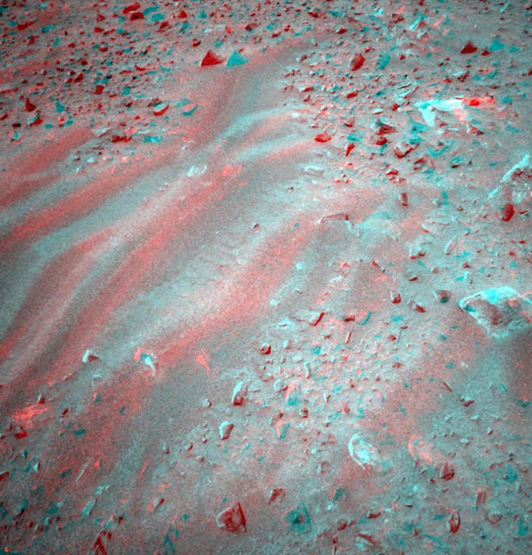 This is a three-dimensional stereo anaglyph of an image taken by the front navigation camera onboard the Mars Exploration Rover Spirit, showing an interesting patch of rippled soil. Spirit took this image on sol 37 (Feb. 9, 2004) after completing the longest drive ever made by a rover on another planet - 21.2 meters (69.6 feet). On sol 38 scientists plan to investigate this interesting location with the microscopic imager and Moessbauer spectrometer on Spirit's instrument deployment device.