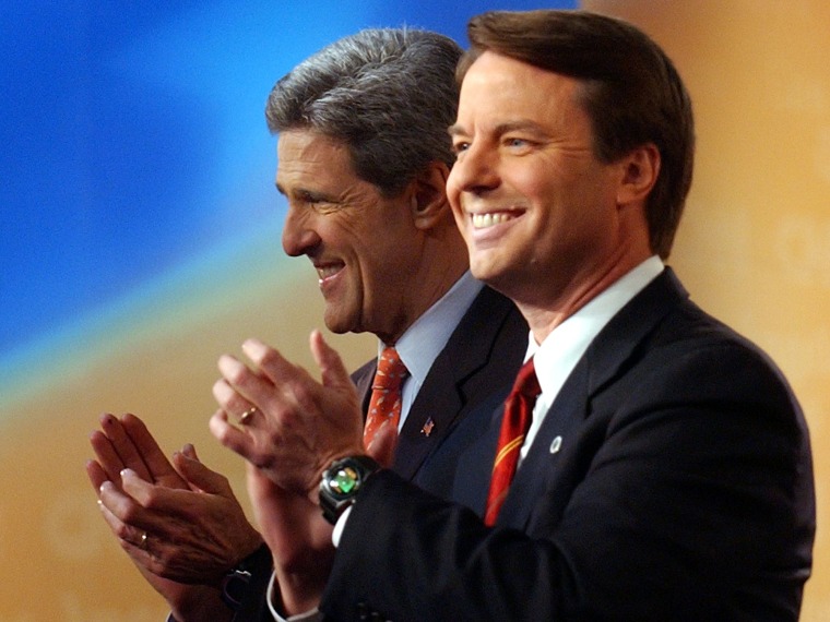 John Kerry, left, and John Edwards applaud before the start of Thursday's debate.