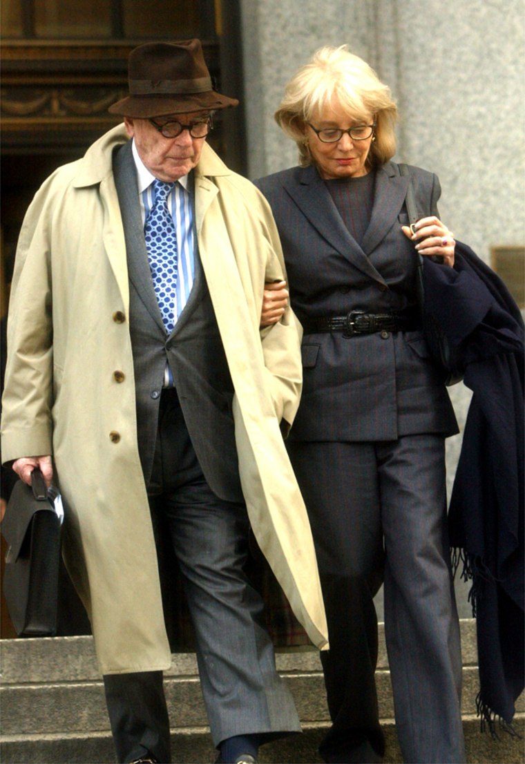 Dominic Dunn, left, and Barbara Walters leave Manhattan federal court after attending the Martha Stewart trial in New York, Tuesday March 2, 2004. 
