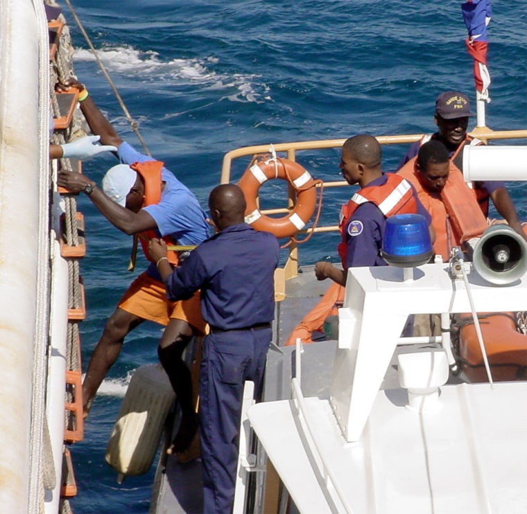 HAITIAN MIGRANT IS TRANSFERED TO US COAST GUARD CUTTER VALIANT AFTER BEING PICKED UP AT SEA