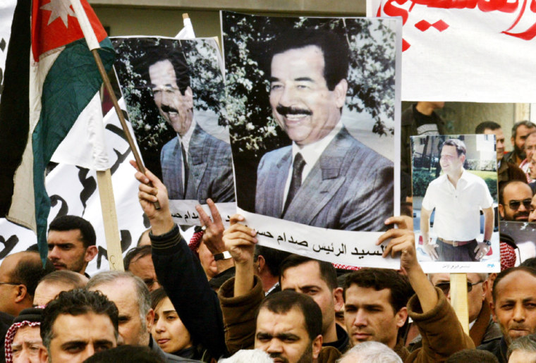 DEMONSTRATORS CARRY PICTURES OF TOPPLED IRAQI PRESIDENT HUSEIN IN AMMAN