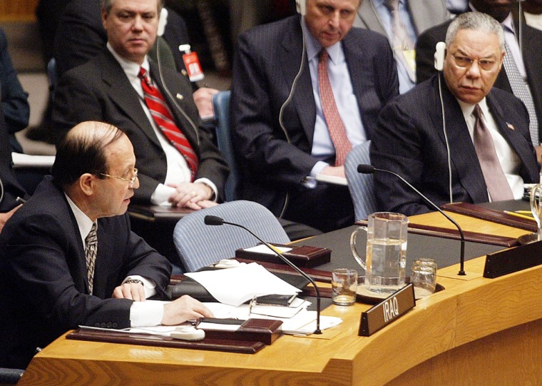Iraq's then U.N. ambassador Mohammed Al-Douri delivers a speech as U.S. Secretary of State Colin Powell looks on at a Security Council meeting on Feb. 14, 2003, during the acrimonious run-up to military action.