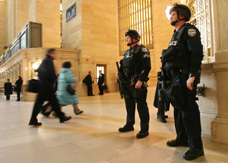 New York City police officers stand guard at Grand Central Terminal last Friday.