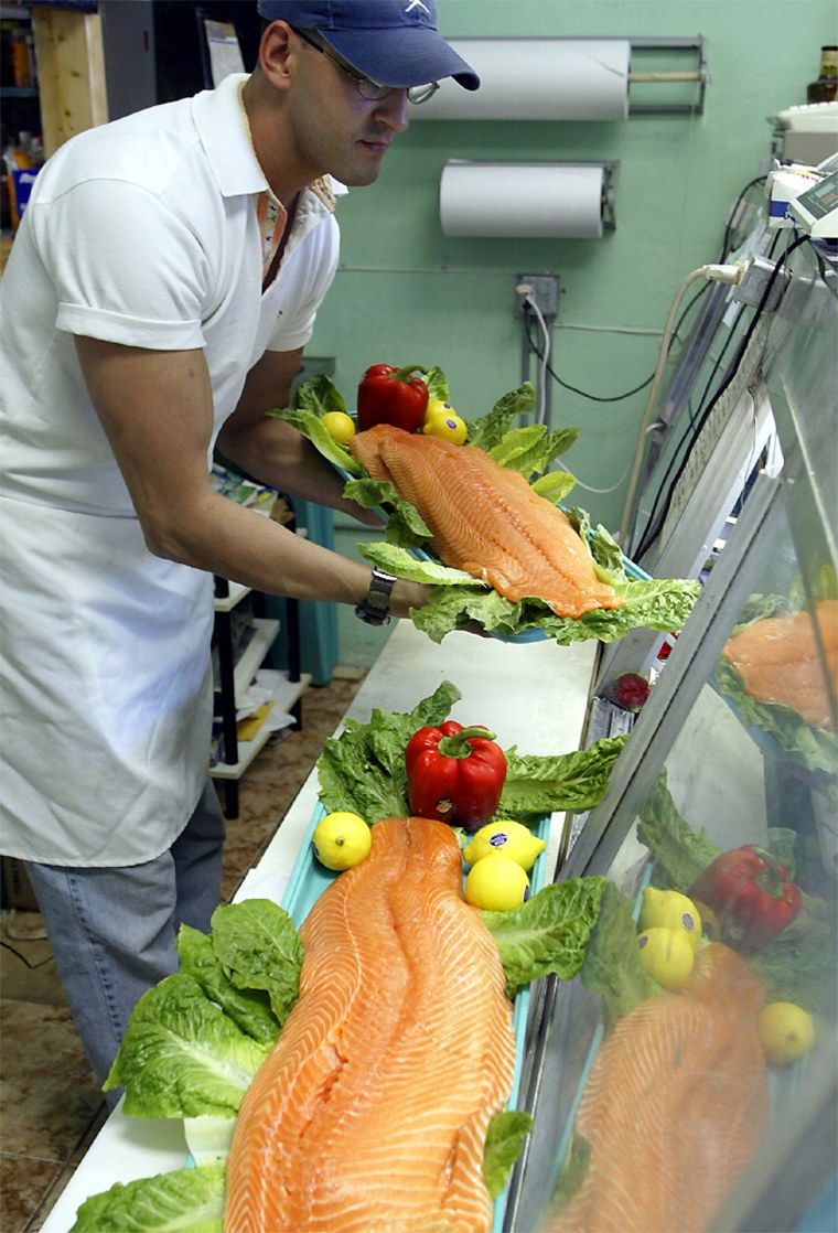The government recommended limiting intake of some fish due to mercury levels, but stressed the benefits of seafood. Fresh salmon, shown here, is known to be low in mercury. 
