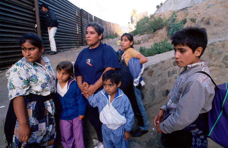 Family from Mexico City is waiting in a sewer culvert to go to Los Angeles. 