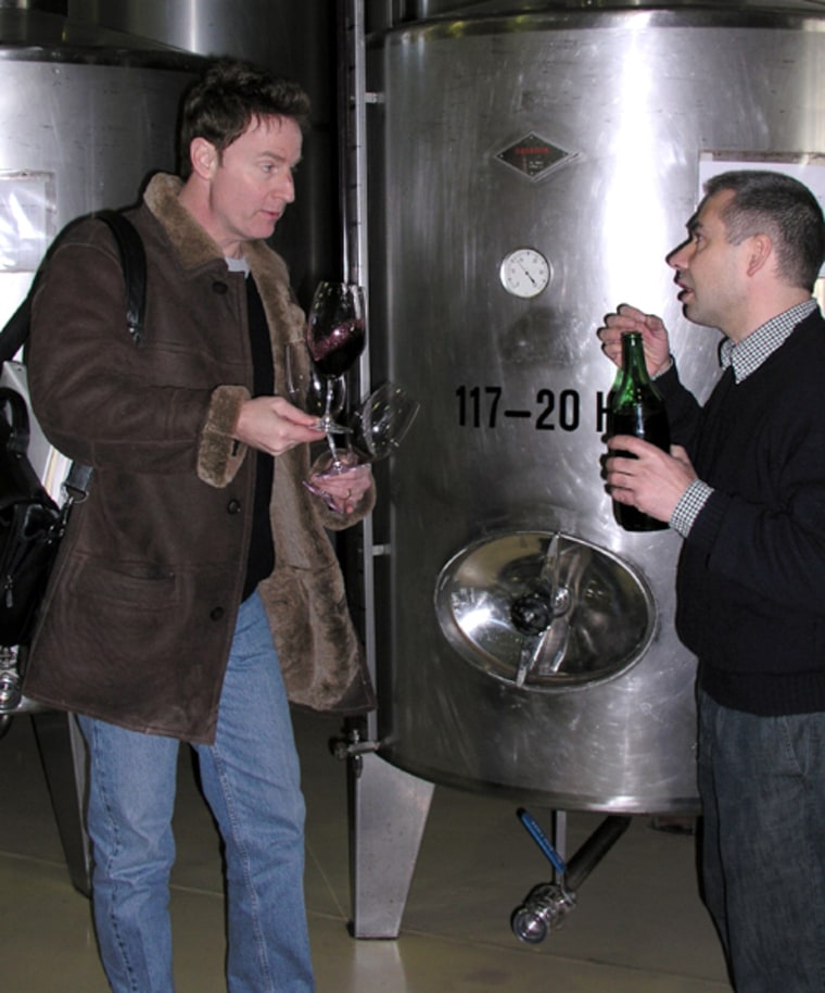 Eric Solomon (left), owner of European Cellars, a U.S. importer of wine, is ready to taste some of that fine wine from the Capcanes winery in Spain.
