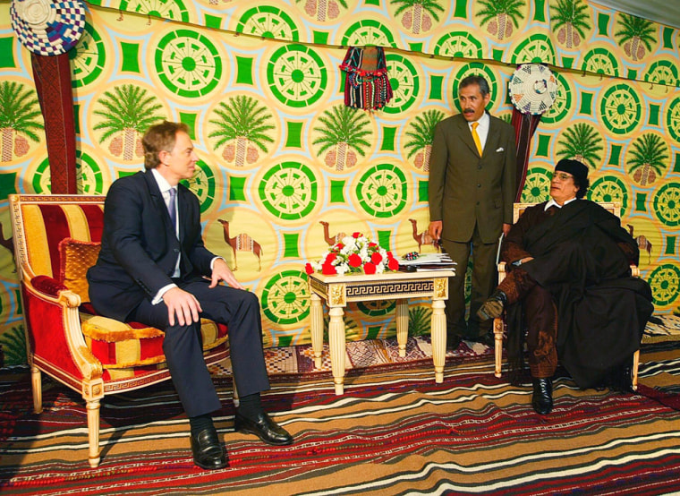 Britain's Prime Minister Tony Blair, left, holds talks with Libyan leader Col. Moammar Gadhafi at a ceremonial tent outside Tripoli on Thursday.