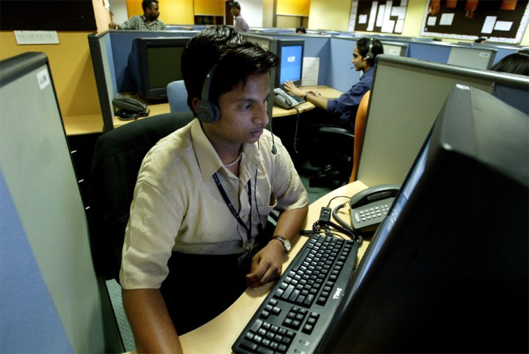 INDIAN EMPLOYEES AT CALL CENTRE PROVIDE INTERNATIONAL CUSTOMER SUPPORT IN BANGALORE