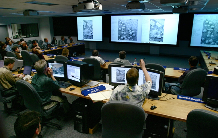 Scientists and engineers plot a course for Opportunity's Sol 47 on Mars during a meeting of the Science Operations Working Group.