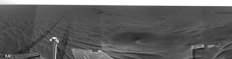 Opportunity's panoramic camera took this picture from the edge of a large trough dubbed "Anatolia," about 500 feet (150 meters) from its landing site in Eagle Crater. The rover's tracks can be traced across Meridiani Planum.