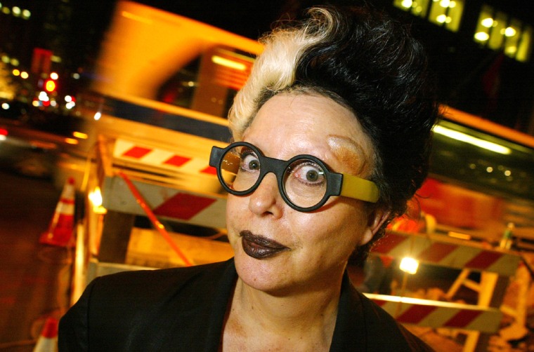 French performance artist Orlan poses April 22 in New York. A bulging saline implant is visible above her left eye. While women in reality shows such as "Extreme Makeover" undergo plastic surgery to improve their looks, Orlan radically transforms herself to challenge traditional perceptions of beauty. 