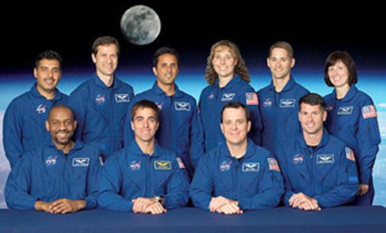 The 2004 astronaut candidate class: Seated, from left, are Bobby Satcher, Chris Cassidy, Ricky Arnold and Shane Kimbrough. Standing, from left, are Jose Hernandez, Tom Marshburn, Joe Acaba, Dottie Metcalf-Lindenburger, Jim Dutton and Shannon Walker. Not shown: Randy Bresnik.