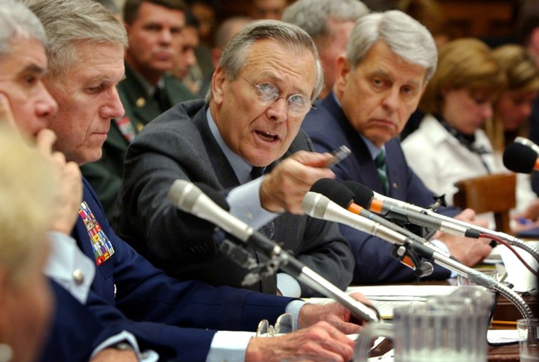 Defense Secretary Donald Rumsfeld gestures as he answers a question asked by a House Armed Services Committee member during the committee hearing on Capitol Hill Friday.