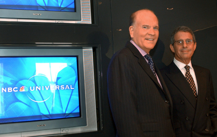 NBC Universal Chairman Bob Wright, left, and Ron Meyer, president and chief operating officer of Universal Studios, pose Wednesday after completing the deal to merge NBC with the Universal entertainment businesses.