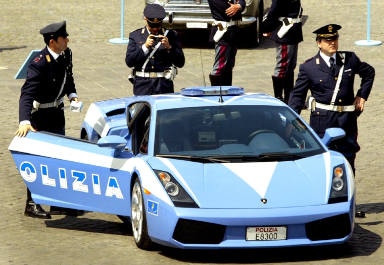 ITALIAN POLICE SHOW OFF THEIR NEW PATROL CAR DURING CELEBRATIONS IN ROME