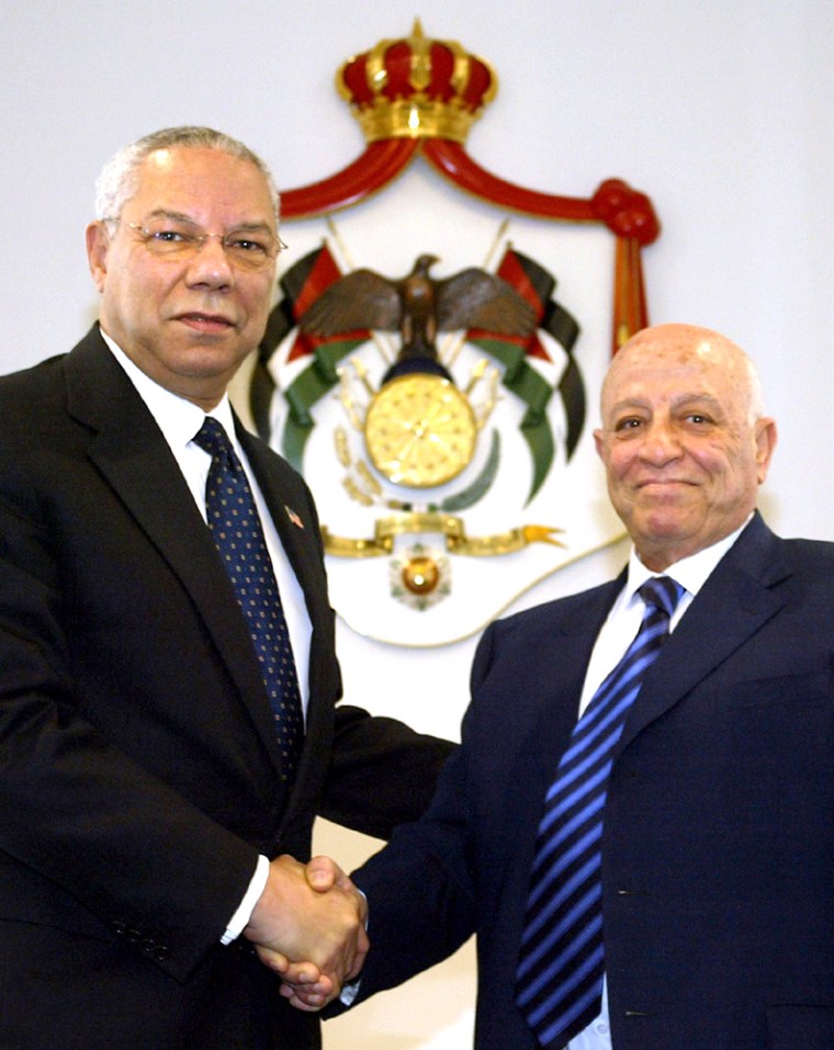 US SECRETARY OF STATE POWELL SHAKES HANDS WITH PALESTINIAN PM QURIE IN AMMAN