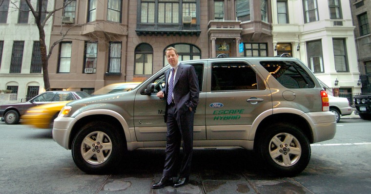 Ford CEO Bill Ford with the new Ford Escape Hybrid after the "Manhattan on a Tank of Gas" fuel economy drive on April 7. The Escape Hybrid covered 576 miles of Manhattan traffic on a single tank of gas, averaging more than 38 miles per gallon.