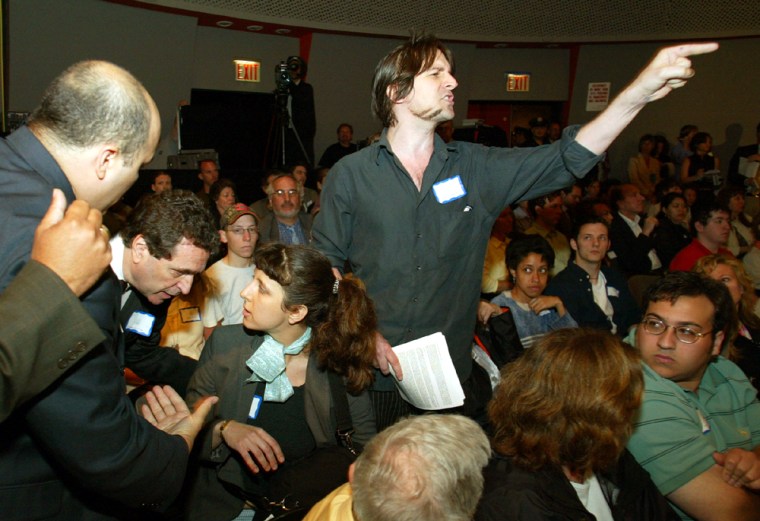 MAN YELLS FROM AUDIENCE DURING DISRUPTION OF SEPTEMBER 11 COMMISSION HEARING