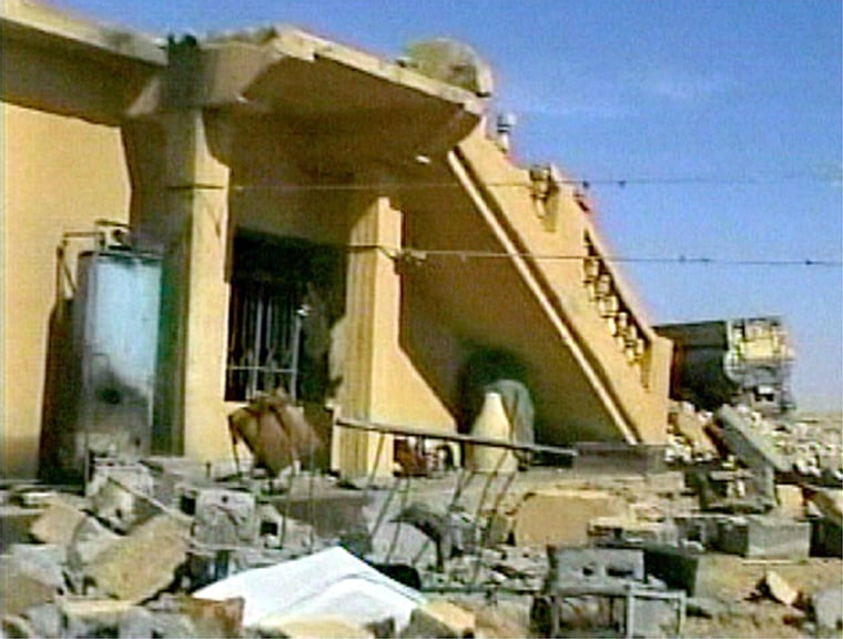 This television image shows a building destroyed during the U.S. airstrike.