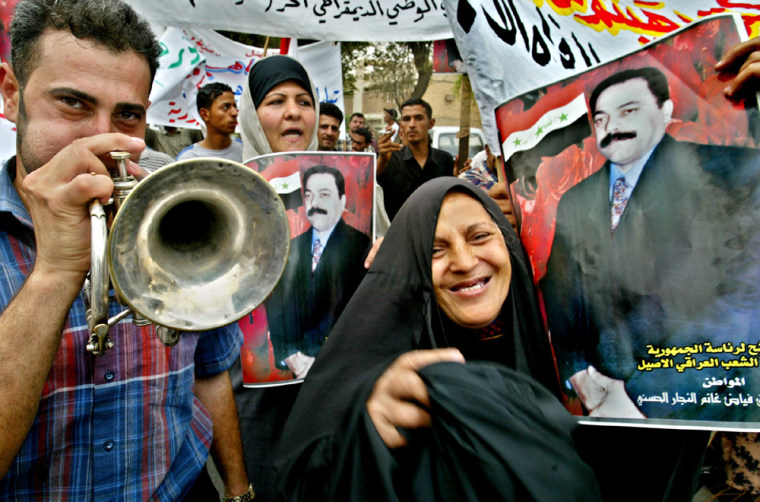 IRAQIS CHANT DURING A DEMONSTRATION IN BAGHDAD