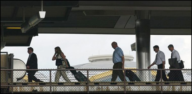 Luggage-hauling Metro riders appear to be getting an early start to the long weekend at the National Airport stop.