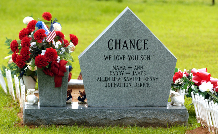 ** ADVANCE FOR SUNDAY, MAY 30 **The back of the tomb stone for James A. Chance III is engraved with the names of family members, shown May 18, 2004.  (AP Photo/Rogelio Solis)