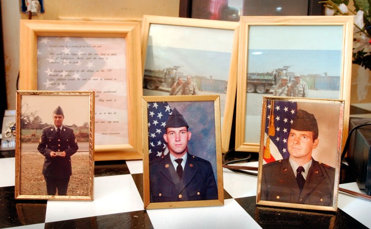 The Chance family of Kokomo, Miss., display undated photographs of their men who have been or currently are in the military, beginning with James A. Chance II, left, in an undated photograph taken in the early 1970s; a photograph of his son, James A. Chance III, center, who was killed in Iraq last year; and his uncle Cecil Chance, who is currently an Army helicopter pilot and has served in Iraq. 