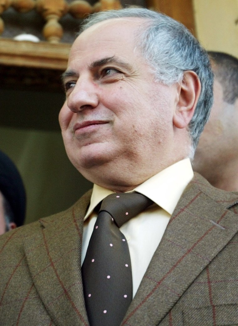 FORMER IRAQI GOVERNING COUNCIL MEMBER AHMAD CHALABI SPEAKS TO REPORTERS IN NAJAF