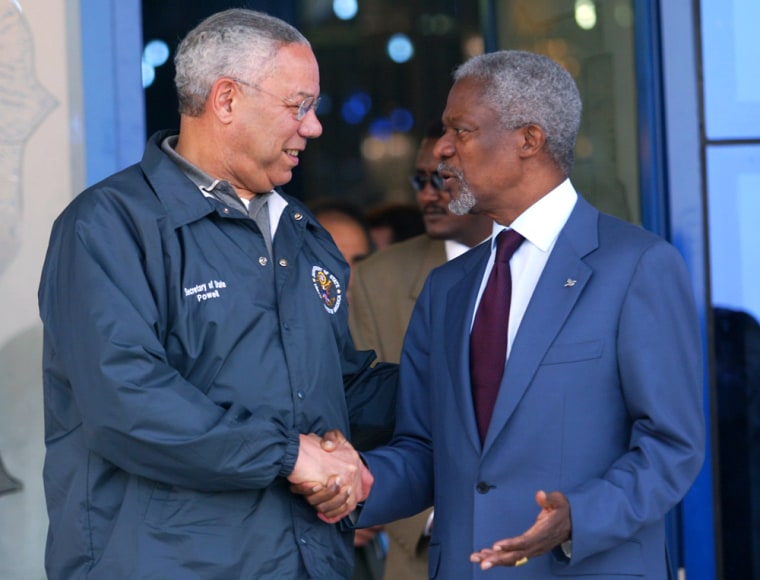 Secretary of State Colin Powell, left, shakes hands Wednesday with U.N. Secretary General Kofi Annan at Khartoum Airport after Powell’s visit to a refugee camp in Darfur province. 