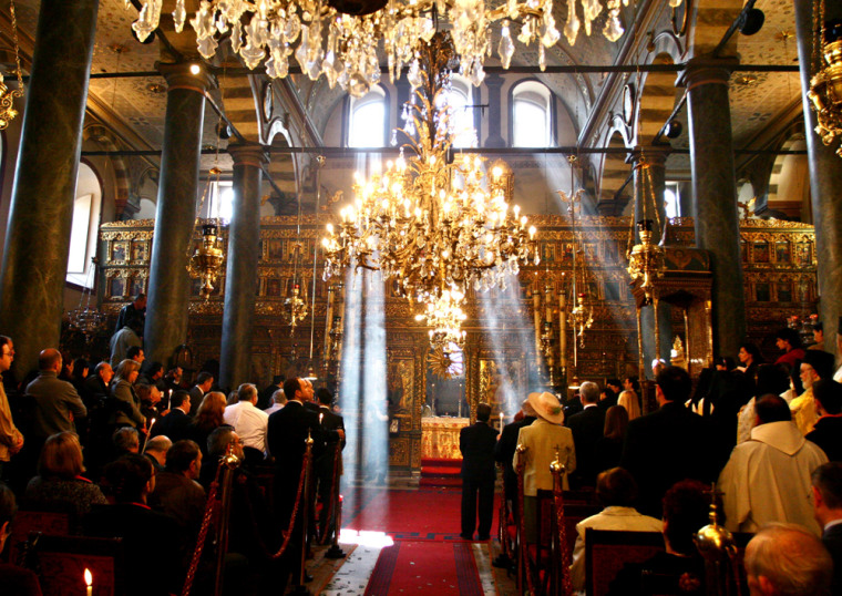 Orthodox worshippers attend a morning mass at the Patriarchal Cathedral of St. George in Istanbul, Turkey, on Sunday. Ecumenical Patriarch Bartholomew I, the spiritual leader of the world's Orthodox Christians, led hundreds of worshippers at a crowded midnight liturgy to celebrate Easter.