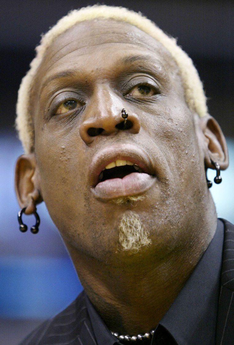 DENNIS RODMAN ATTENDS LAKERS AND ROCKETS PLAYOFF GAME
