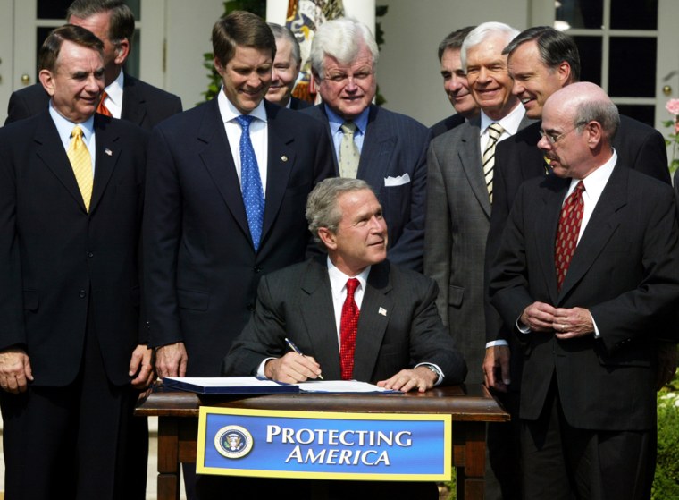 President Bush signs the BioShield legislation in the Rose Garden of the White House July 21.