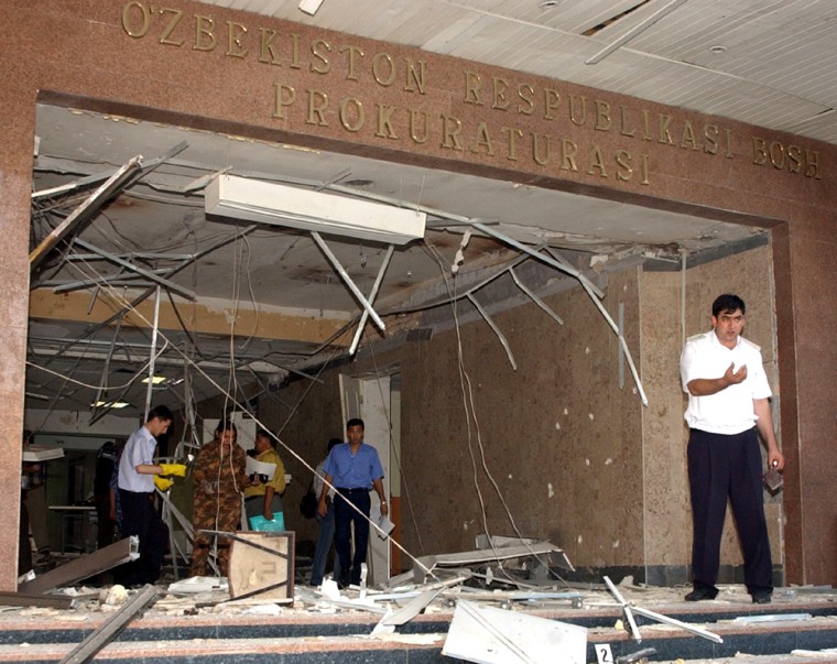 Uzbek specialists investigate the blast scene in Tashkent