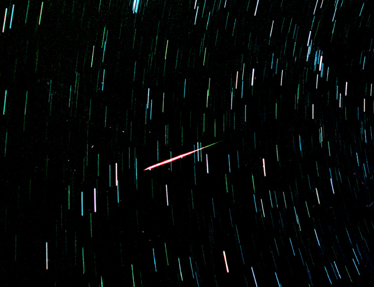 LEONID METEOR STREAK THROUGH STAR PATTERN LIGHTING UP THE SKY