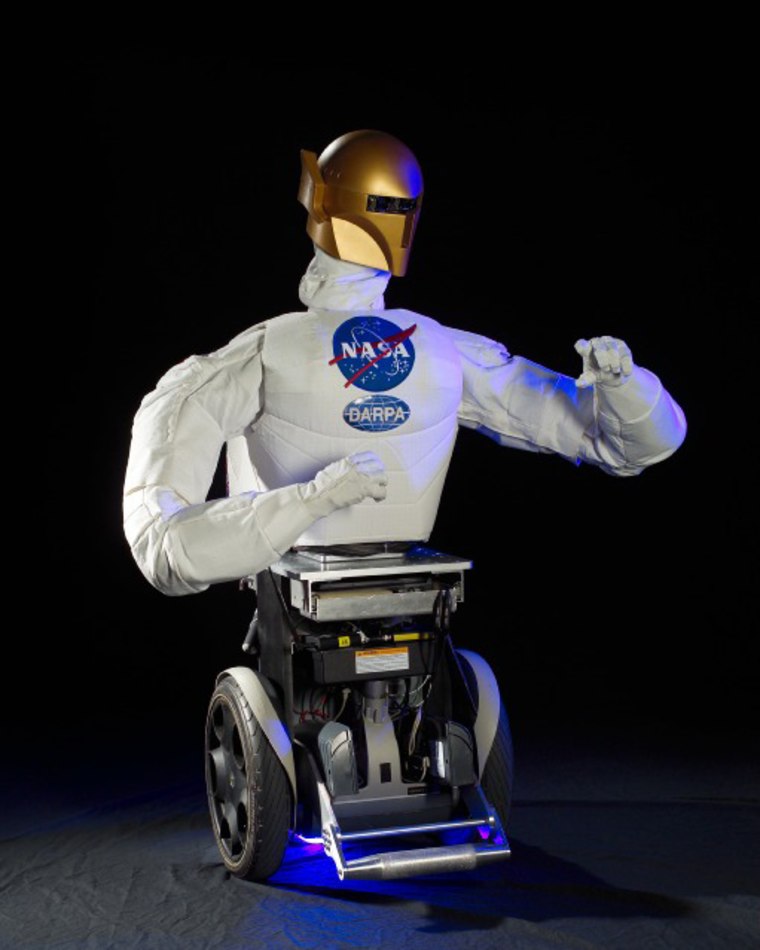 Robonaut B has video-camera eyes and humanlike hands, plus a modified Segway scooter for mobility.