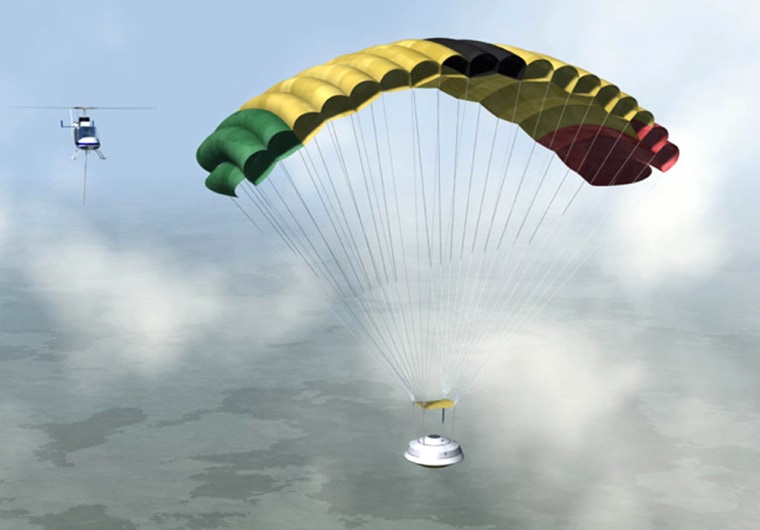 An artist's conception shows the Genesis sample return capsule drifting down on a parafoil, with a helicopter approaching to snag it.