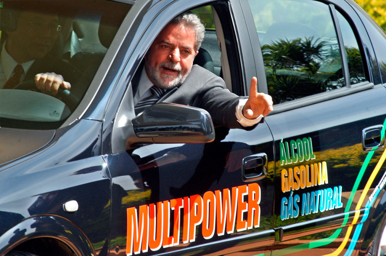 Even Brazilian President Luiz Inacio Lula da Silva has gotten behind the flex-fuel concept, here driving GM's first factory-produced car that runs on gasoline, alcohol or natural gas.