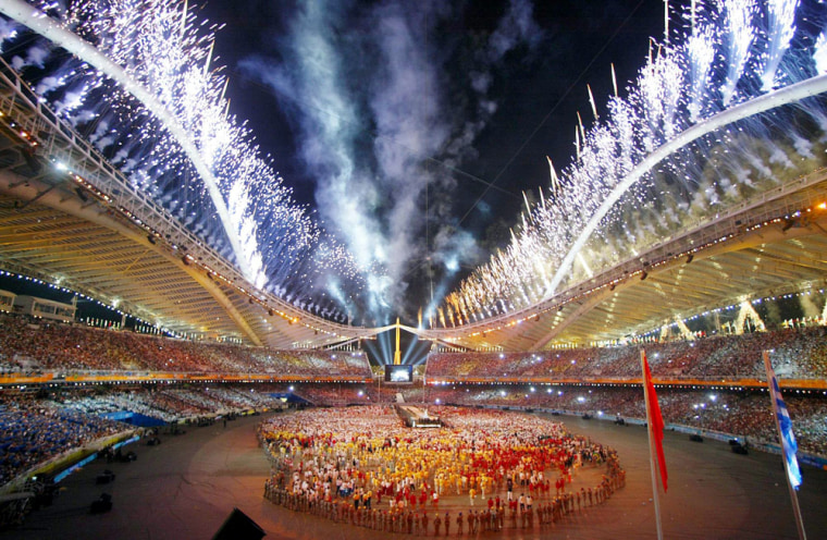 Fireworks light up during closing ceremonies of the Summer Games in Athens.