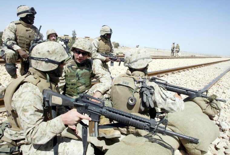 Lt. Gen. James T. Conway, Commanding General of Ist Marine Expeditionary Force, second left, in the outskirts of Fallujah in April. 