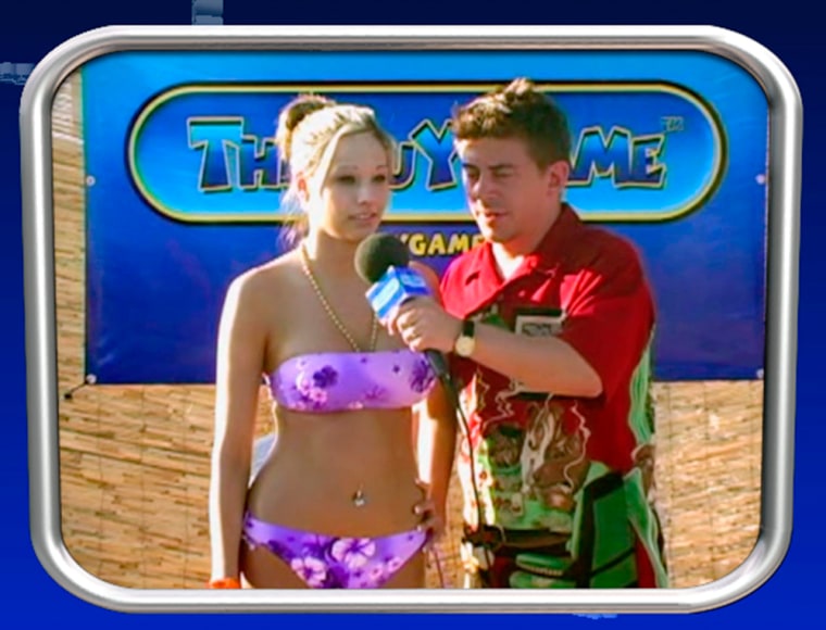 A young woman is asked a trivia question prior to her likely indecent exposure in this image from "The Guy Game."