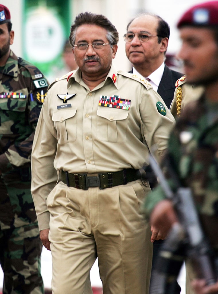 Pakistans President Pervez Musharraf visits a defense exhibition in Karachi