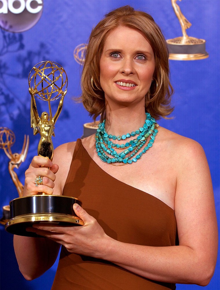 Cynthia Nixon poses with her trophy for outstanding supporting actress in a comedy series for her role in Sex in the City at the 56th Annual Primetime Emmy Awards, Sunday, Sept. 19, at the Shrine Auditorium in Los Angeles. (AP Photo/Reed Saxon)