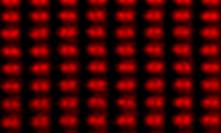 Looking straight down on a silicon crystal, this undated image from the Oak Ridge National Laboratory in Oak Ridge, Tenn., shows dumbbell-shaped rows of atoms at a world record resolution of 0.6 angstrom - about 1 millionth the diameter of a human hair. The results were appeared in a Sept. 17, 2004, article in the Journal Science. (AP Photo/ORNL)