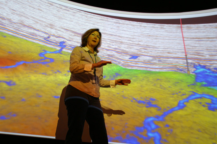 Geologist Vicky Sare leads the team of scientists at ChevronTexaco that is using advanced visualization technology to find oil that conventional 2D maps may have missed.