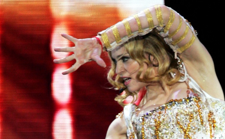 Warner Music artist Madonna performs during her concert in Lisbon, Portugal earlier this month. A Warner Music IPO would seek to exploit signs of a recovery in global music sales after four years of declining demand.