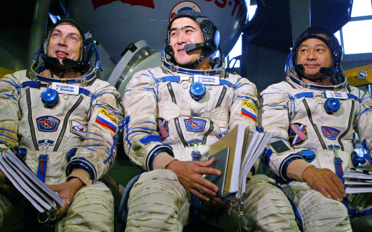 Yuri Shagarin, Salizhan Sharipov and Leroy Chiao will have to wait a few more days before launching off to the international space station.