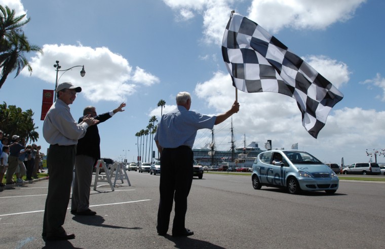 A ceremonial checkered flag greets the eight fuel cell cars in San Diego at the end of the California Fuel Cell Partnership's four-day drive through Southern California.