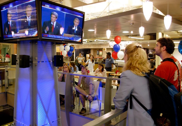 University students watch the first presidential debate in Washington DC