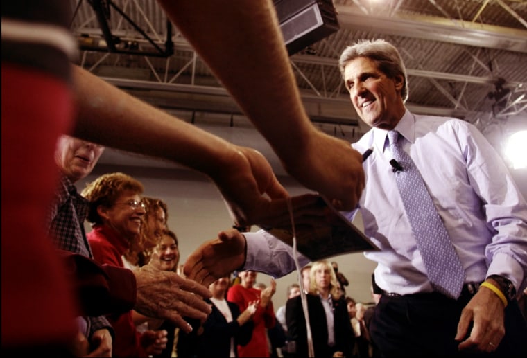 US Democratic presidential nominee Kerry greets people at Town Hall meeting in Iowa