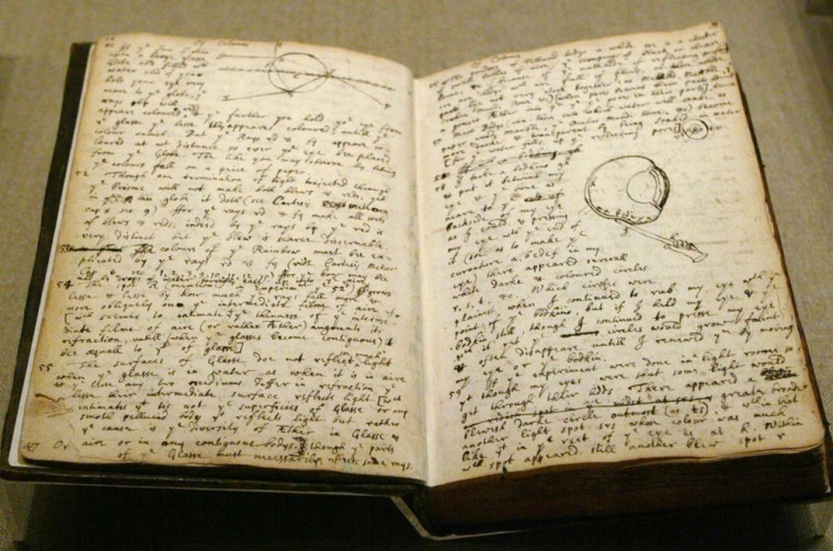 A notebook belonging to Isaac Newton describing an experiment he conducted on his himself placing a sharp instrument between his eye and the bone in order to induce the sensation of color is on display at \"The Newtonian Moment\" exhibit at the New York Public Library, during a preview Thursday, Sept. 30, 2004 in New York.   (AP Photo/Mary Altaffer)